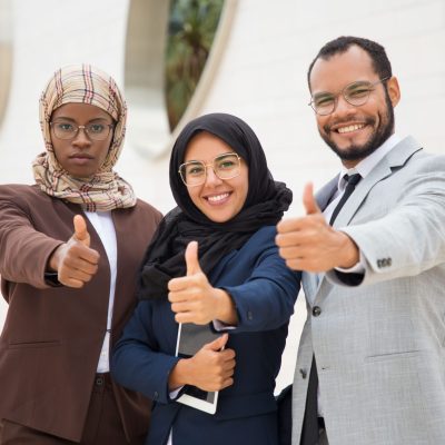 multicultural-business-group-posing-making-like-gesture (1)