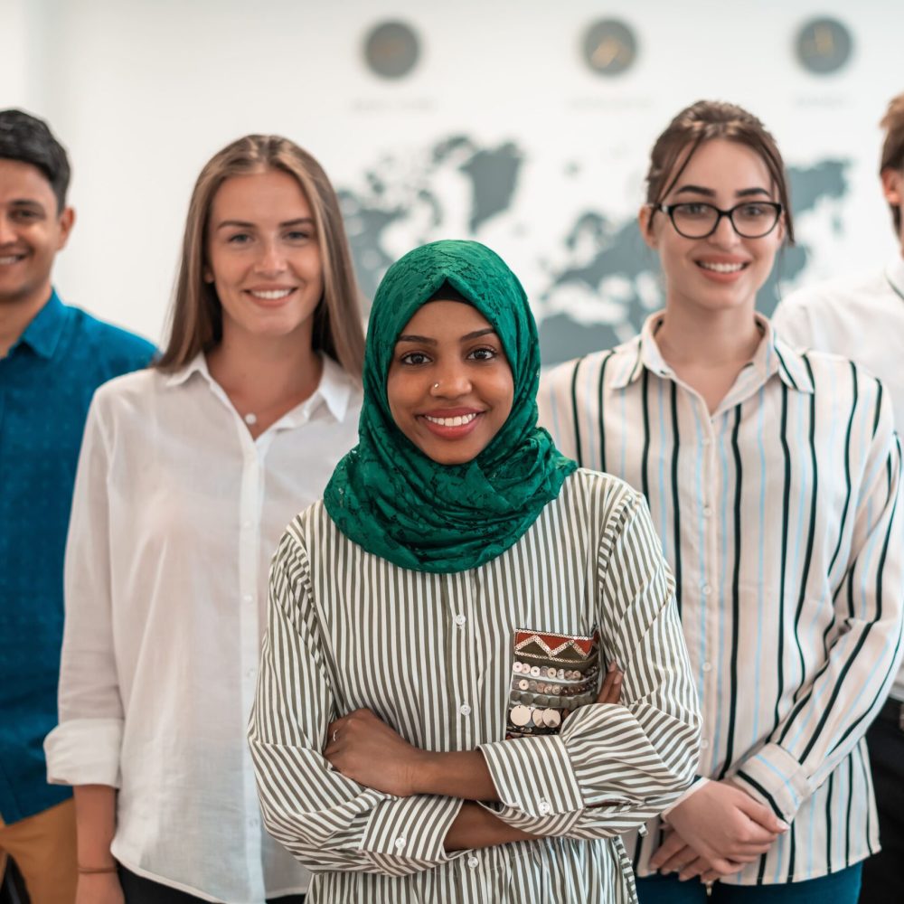 vecteezy_portrait-of-young-excited-multiethnics-business-team-of_12534697 (1)